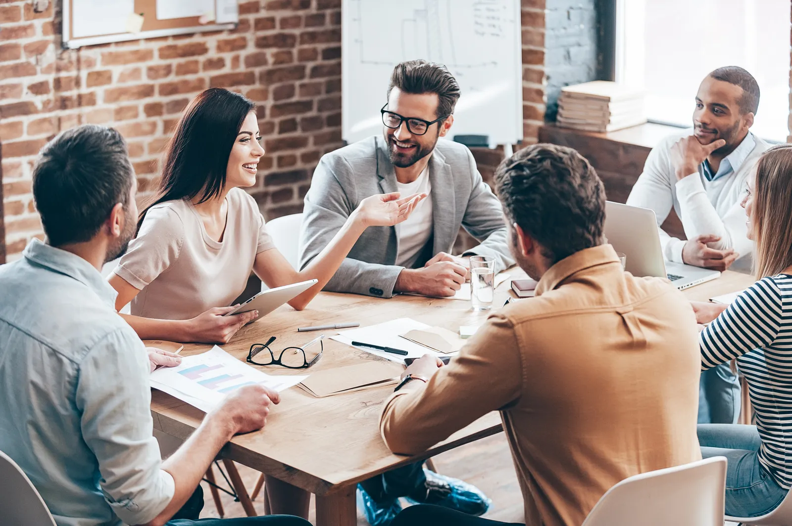 A team in discussion around a table